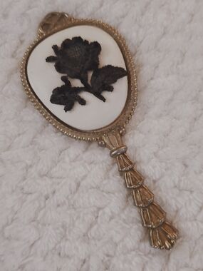 Vintage Gold Hand Mirror with Black Floral Medallion